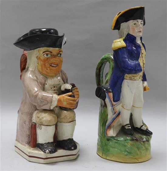 An early pearlware Toby jug and later jug of Nelson